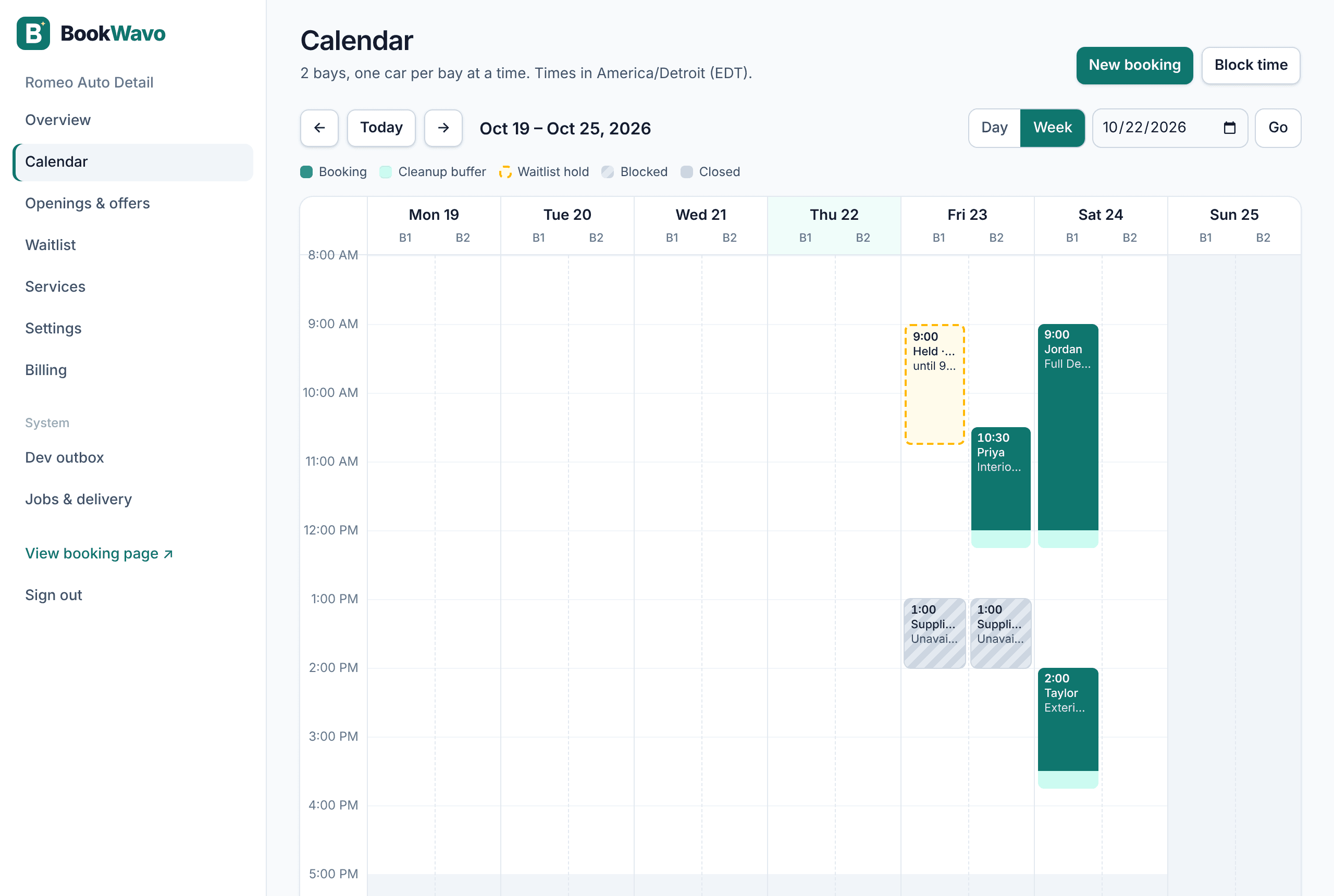 BookWavo week calendar for a detailing shop: bookings in teal, a dashed amber 9:00 AM block held for a waitlist customer, and blocked time for a supplier pickup.